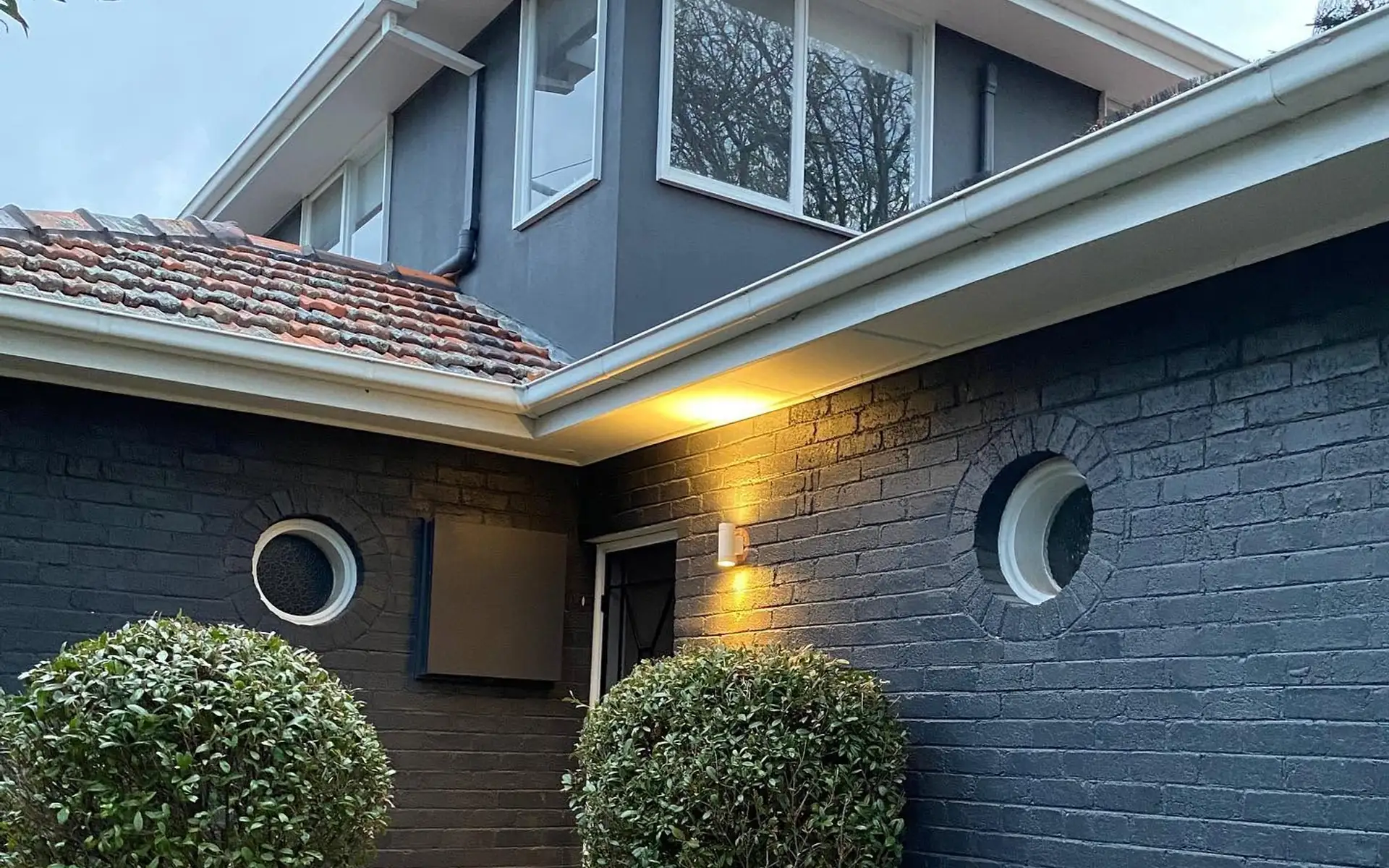 Exterior entry lighting installed at a home