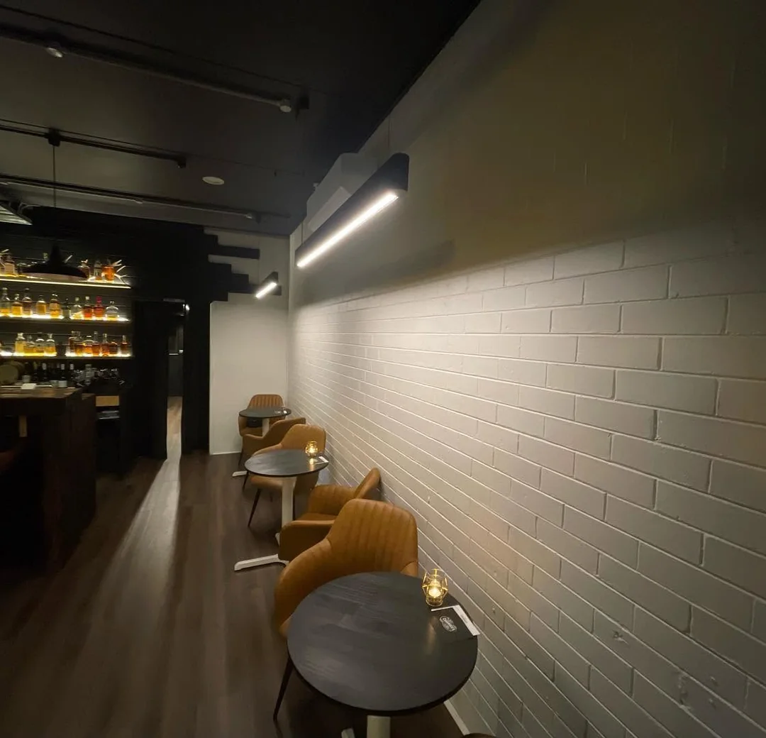 Bar interior with feature lighting installed during a fit-out