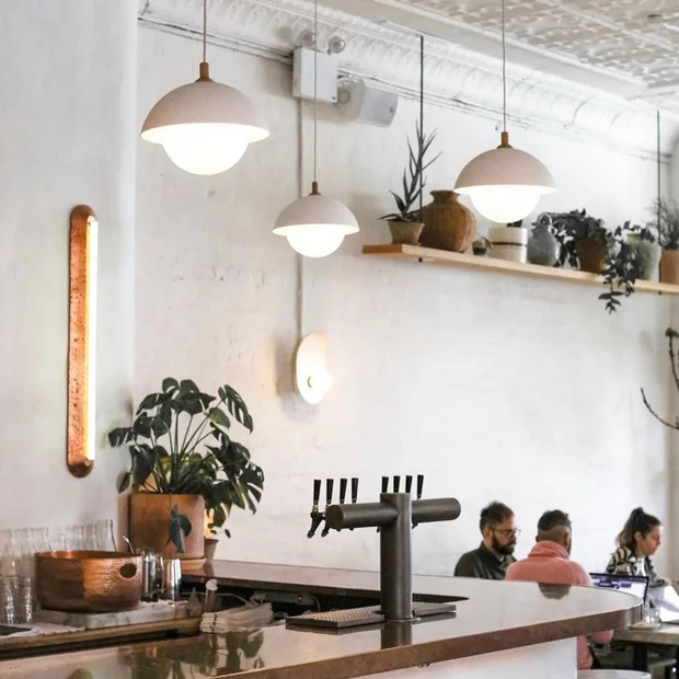 Pendant lighting above a cafe counter