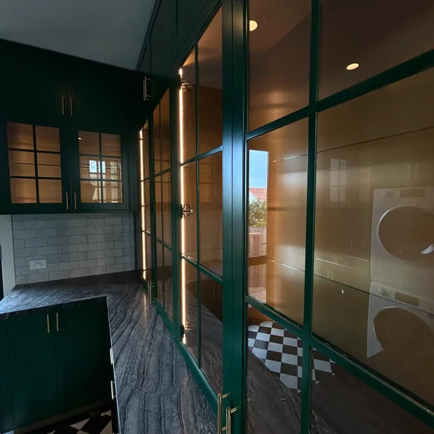 Green joinery and display lighting in a venue