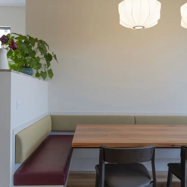 Pendant light over a built-in dining nook