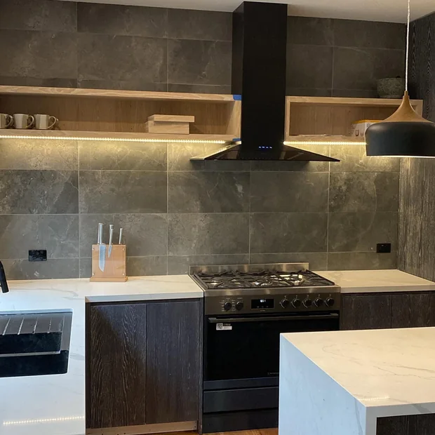Kitchen pendant beside a rangehood