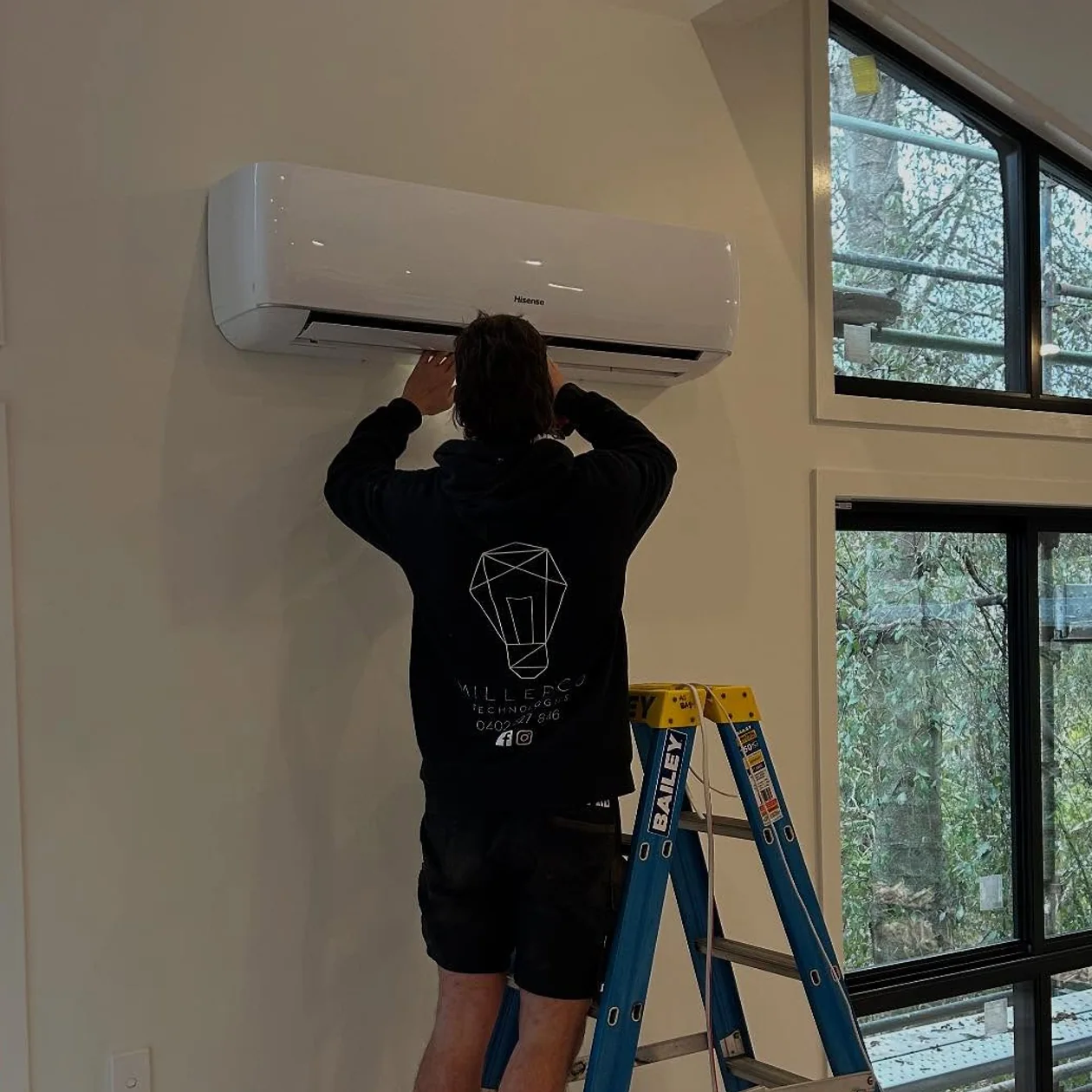 MillerCo Technologies electrician at work in a home