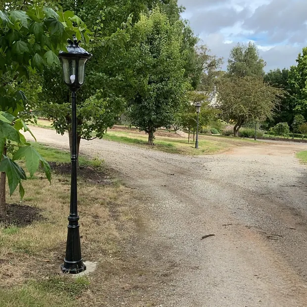 Garden post light beside a driveway