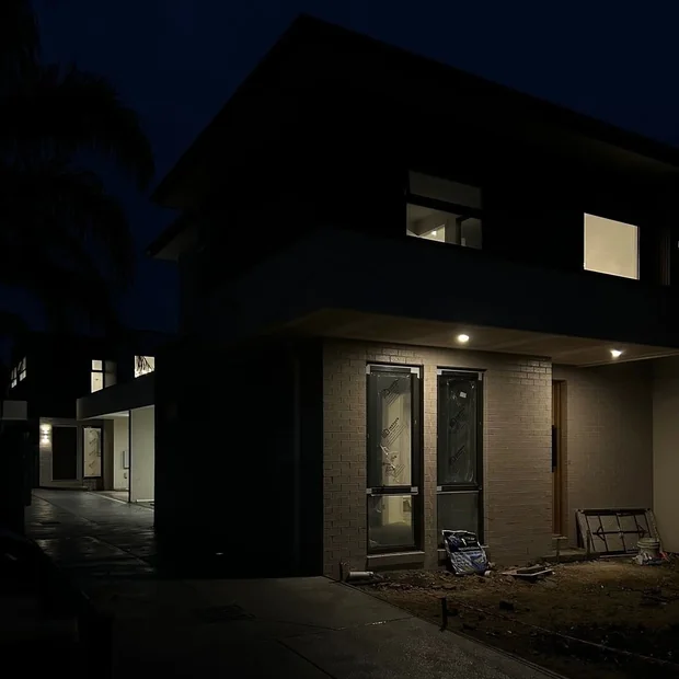 Exterior of a home lit at night