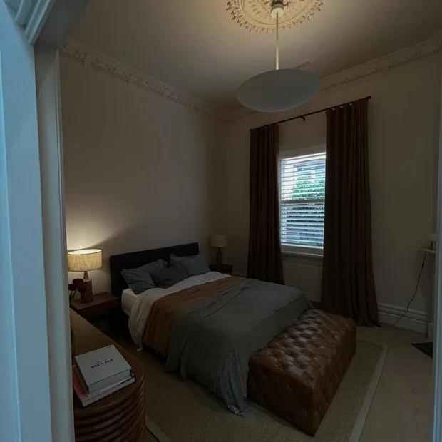 Bedroom with a restored ceiling rose and pendant