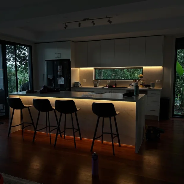 Kitchen island with under-bench lighting