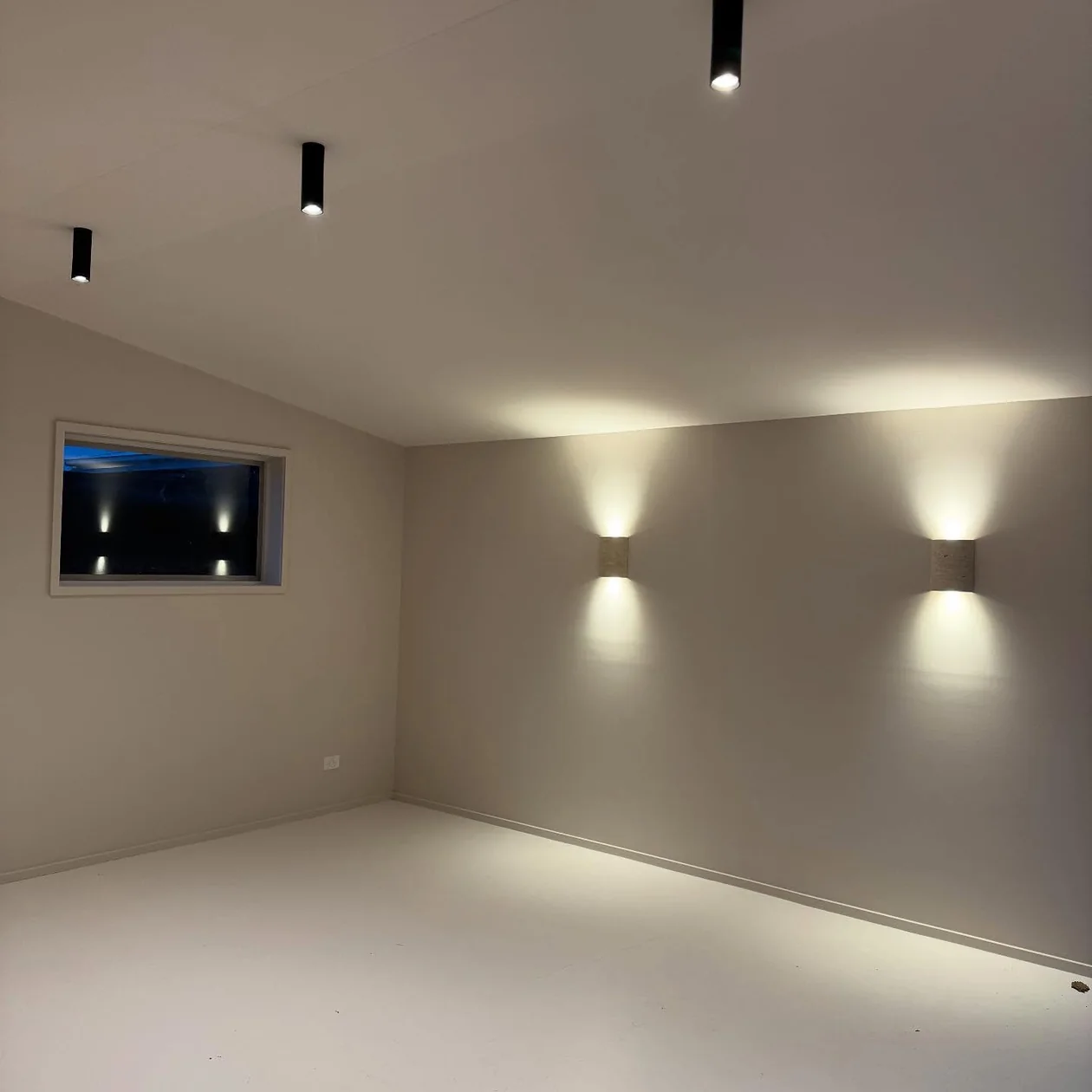 Wall uplights in a living space